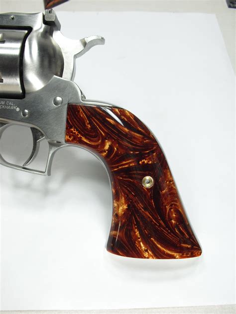 The <strong>Blackhawk</strong> replicated the size of the old Colt Single Action in both frame. . Ruger blackhawk 357 custom grips